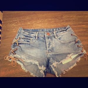 Super cute denim shorts with lace up sides